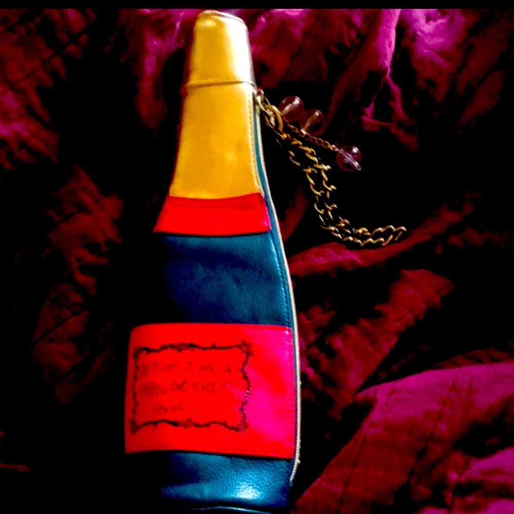 Rare Betsey Johnson champagne wristlet